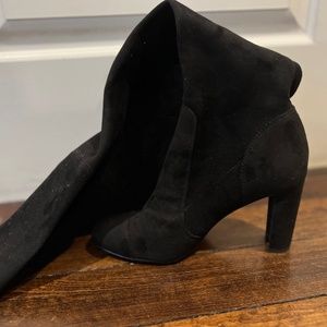 Tall black suede boots